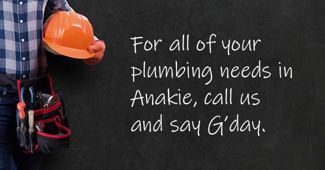 A plumber standing with text on the background relating to Anakie plumbing services