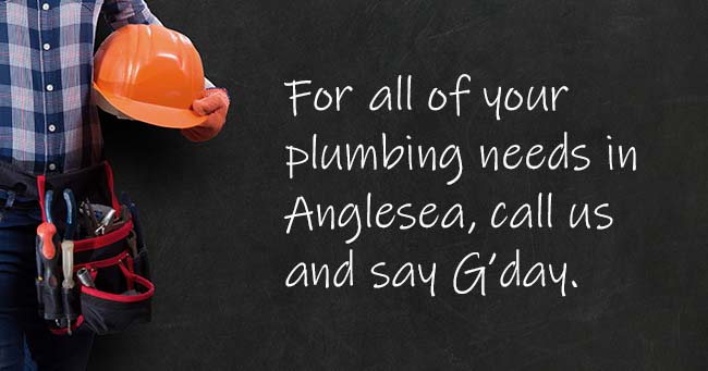 A plumber standing with text on the background relating to Anglesea plumbing services