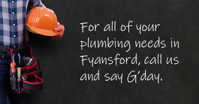 A plumber standing with text on the background relating to Fyansford plumbing services
