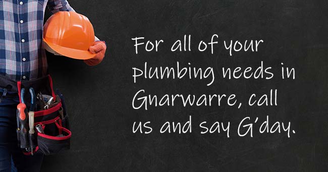 A plumber standing with text on the background relating to Gnarwarre plumbing services