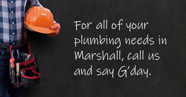 A plumber standing with text on the background relating to Marshall plumbing services