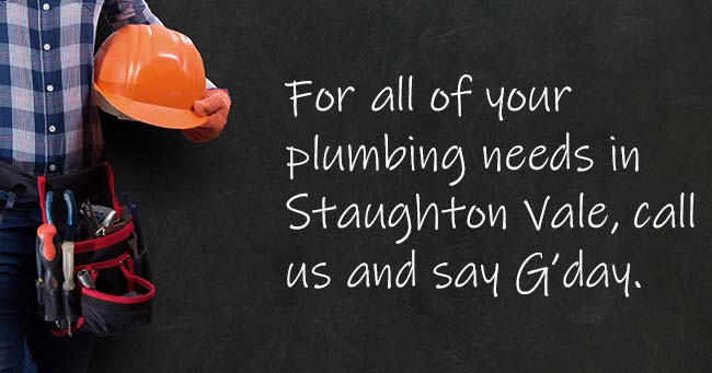 A plumber standing with text on the background relating to Staughton Vale plumbing services