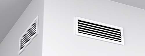 Ducted heating vents on the wall