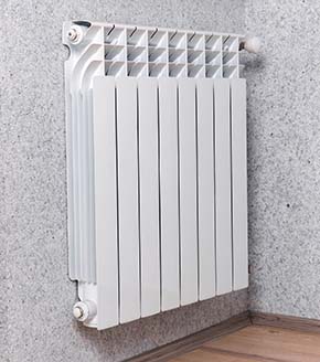 New hydronic heating radiator installed