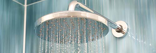 Shower head with running hot water